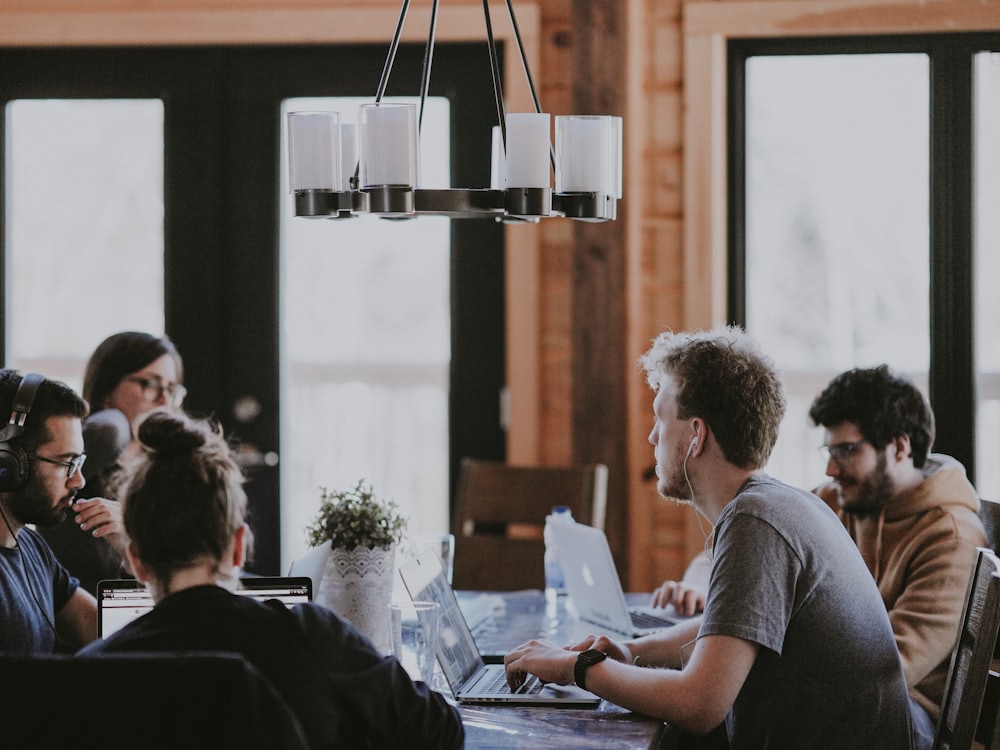 Team members working together around a table