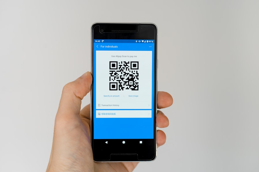 Person completing a payment on a mobile phone